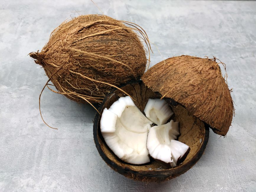 Fresh coconut whole and cracked